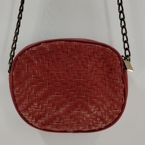 Anthropologie red rust weave round faux vegan leather crossbody with chain strap